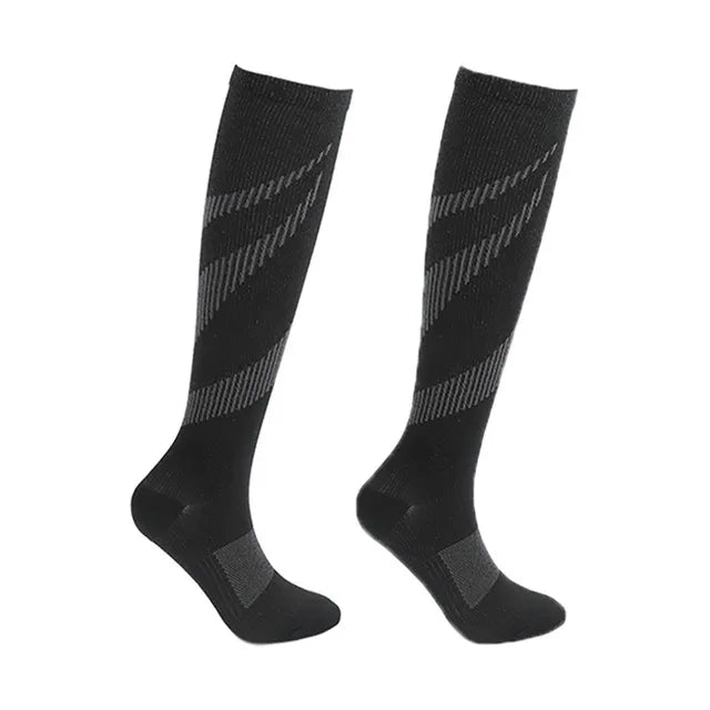 Experience all-day comfort and performance with knee-high compression socks from Brand NONE, designed for you as an athlete and everyday mover, with soft yet supportive fabric that improves your circulation and speeds recovery after workouts.