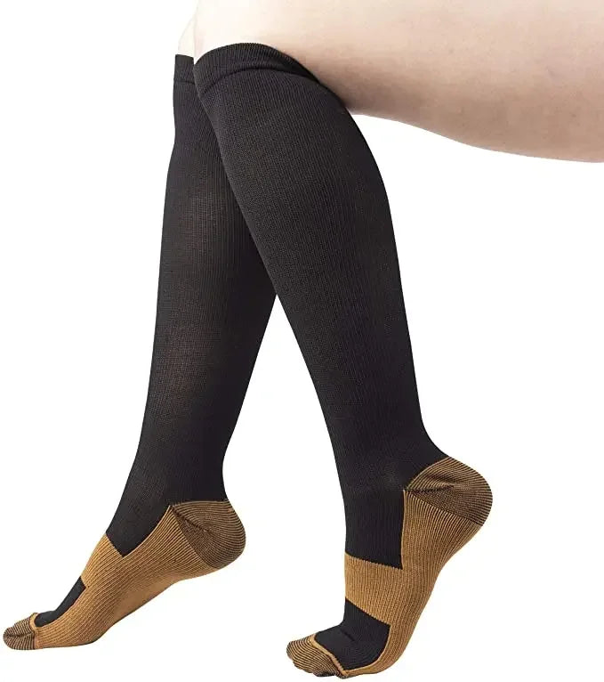 Experience all-day comfort and performance with knee-high compression socks from Brand NONE, designed for you as an athlete and everyday mover, with soft yet supportive fabric that improves your circulation and speeds recovery after workouts.